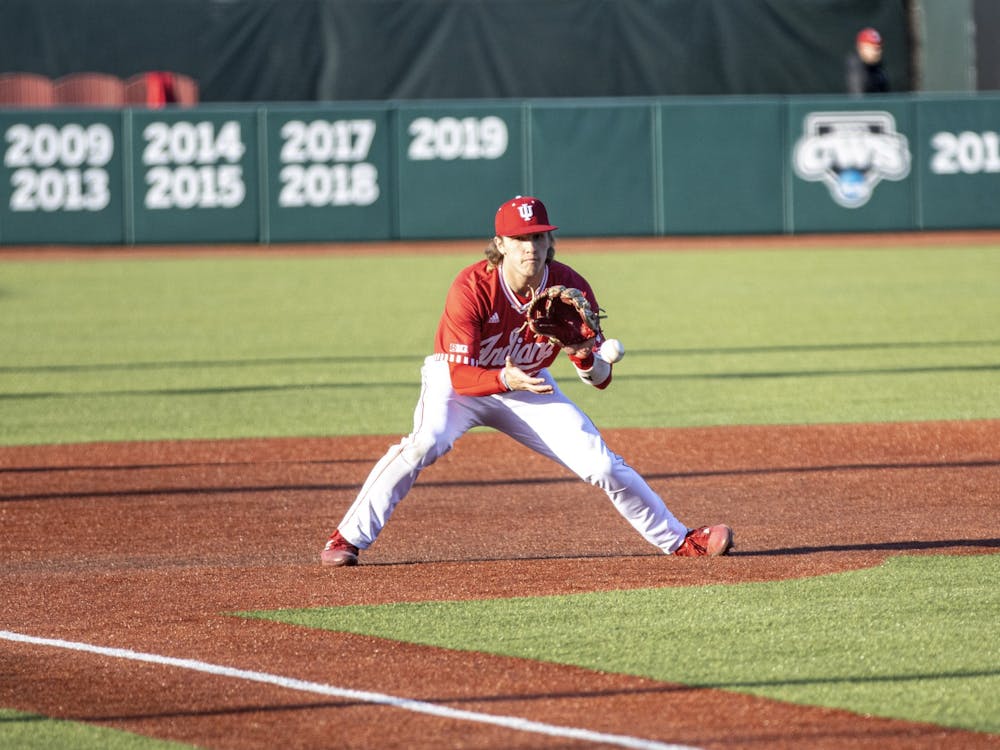 Freshman third basemen Josh Pyne fields a ground ball on the hop during the game against Purdue Fort Wayne on March 9, 2022, at Bart Kaufman Field. IU lost to Rutgers on Sunday morning 2-14, officially ending their season. 