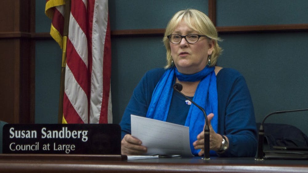 Susan Sandberg discusses wages for firefighters and police officers Oct. 8, 2014, at the City Council Meeting in City Hall. When Sandberg joined Bloomington City Council, it was an all male council.&nbsp;