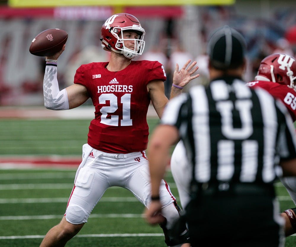 Junior quaterback RIcahrd lagow throws a pass during the first quater against Ball State on Saturday.
