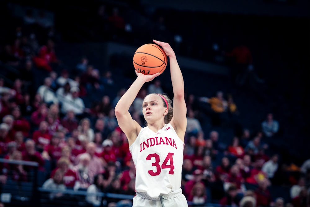<p>Senior guard Grace Berger shoots a jumper March 3, 2023, at the Target Center in Minneapolis. Indiana defeated Tennessee Tech 77-47 on Saturday.</p>