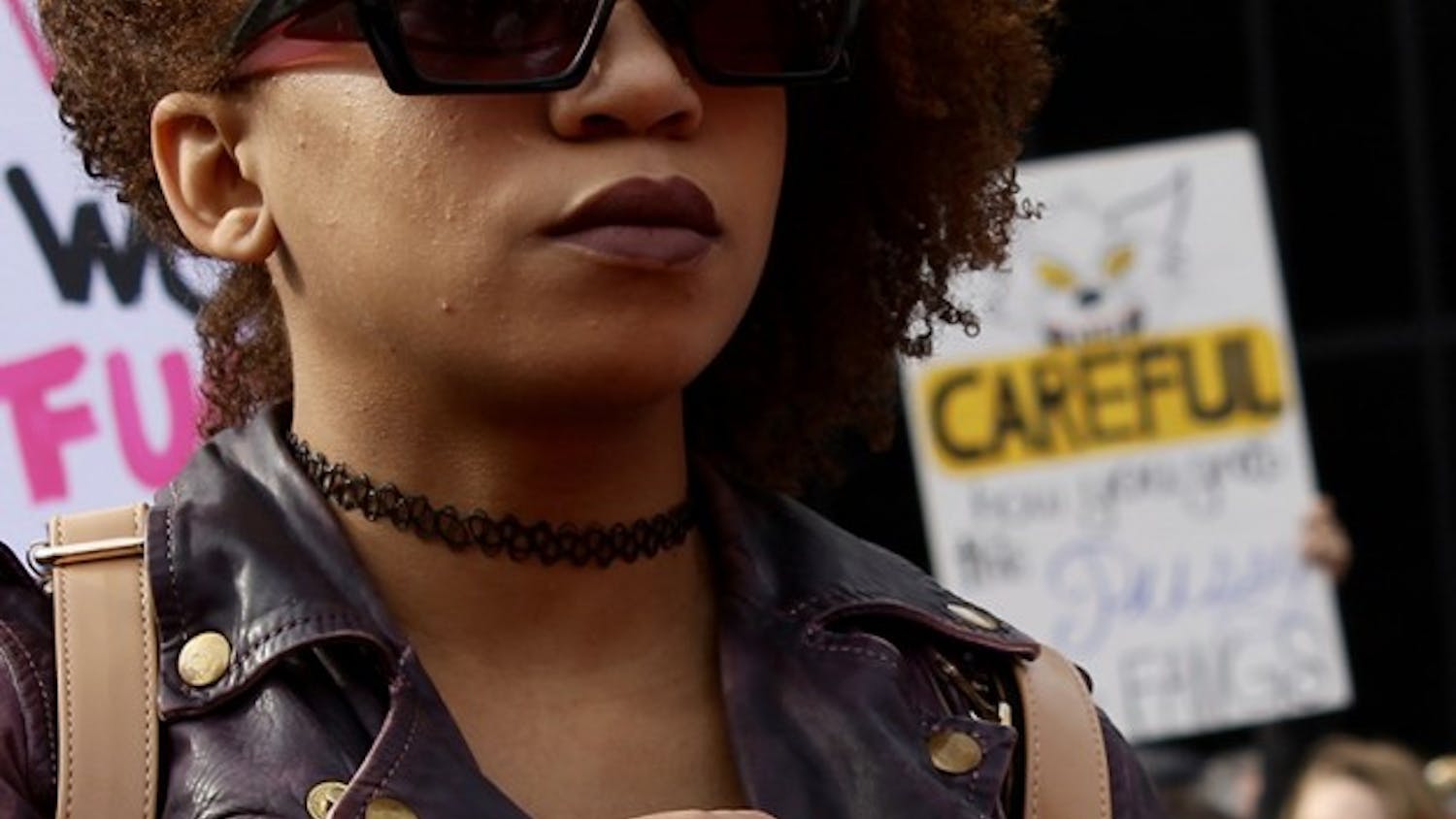  Paeton Chavis, 24, holds a sign during the Women's March in Indianapolis on Saturday afternoon. 