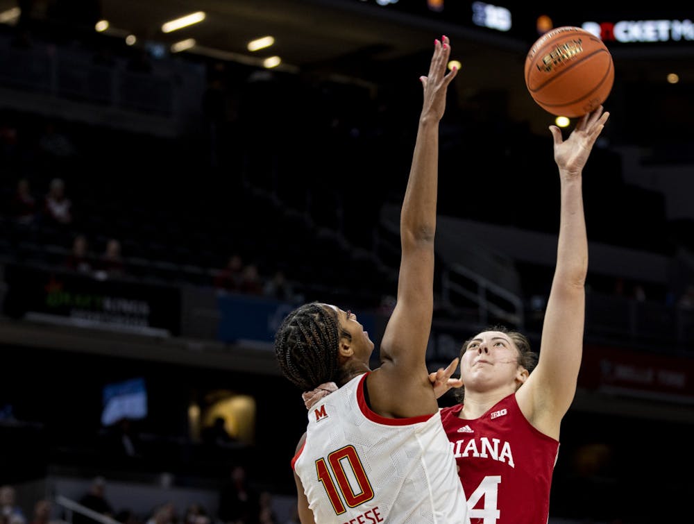 <p>Junior forward Mackenzie Holmes attempts a shot during Indiana&#x27;s Big Ten Tournament game against Maryland on March 4, 2022, at Gainbridge Fieldhouse in Indianapolis. Indiana will play Ohio State at 3:30 p.m. in Indianapolis. </p>