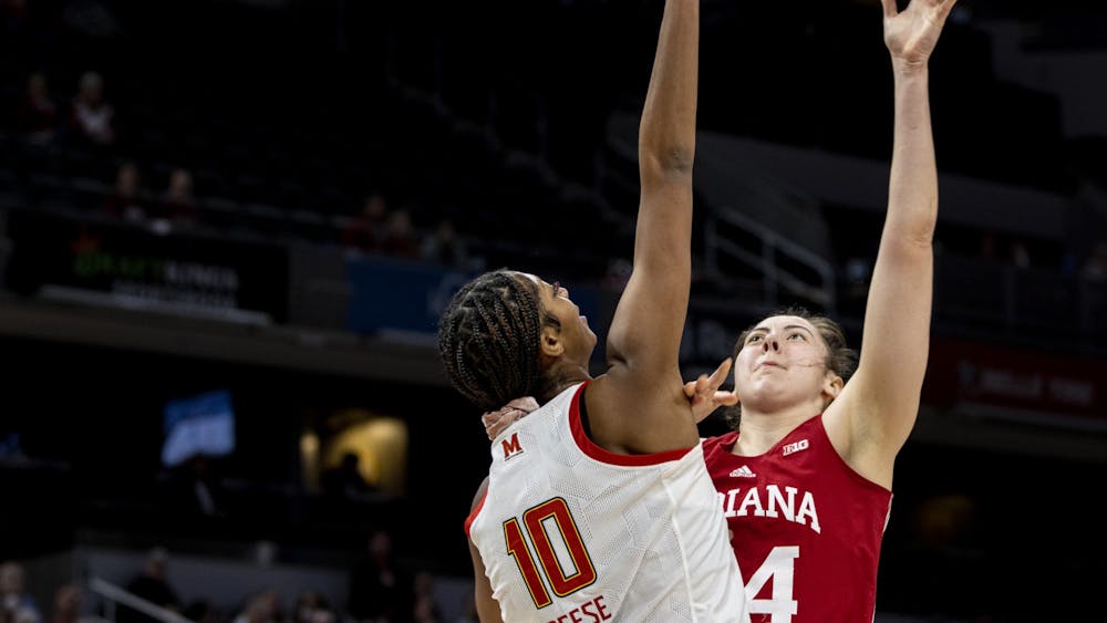 Junior forward Mackenzie Holmes attempts a shot during Indiana&#x27;s Big Ten Tournament game against Maryland on March 4, 2022, at Gainbridge Fieldhouse in Indianapolis. Indiana will play Ohio State at 3:30 p.m. in Indianapolis. 