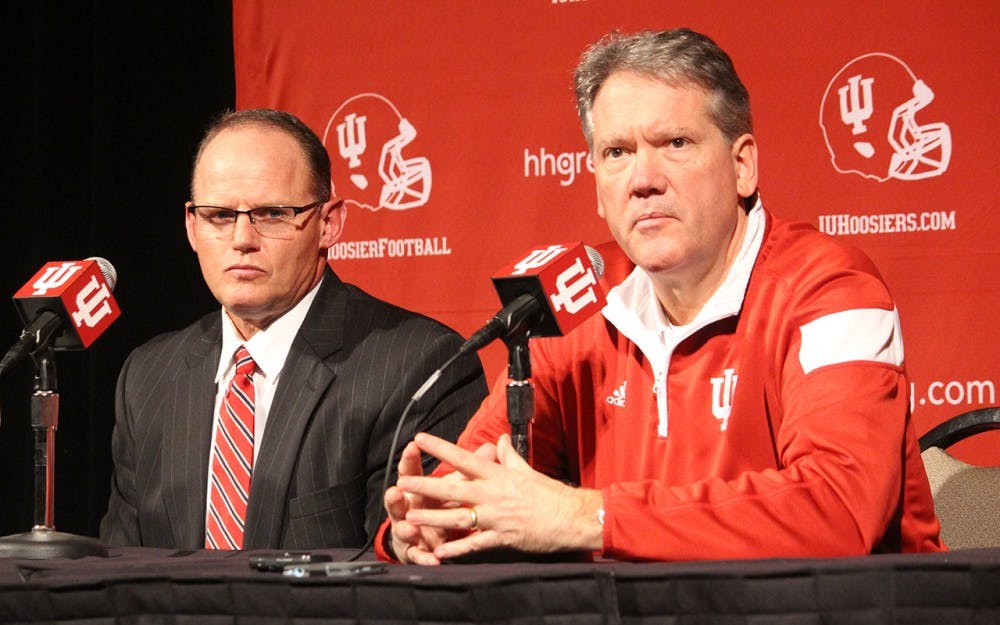 IU Director of Athletics Fred Glass and Tom Allen sit at the desk during Wednesday nights press conference following Kevin Wilson's resignation from the football program. Glass named Allen the new head coach of the football program effective immediately.