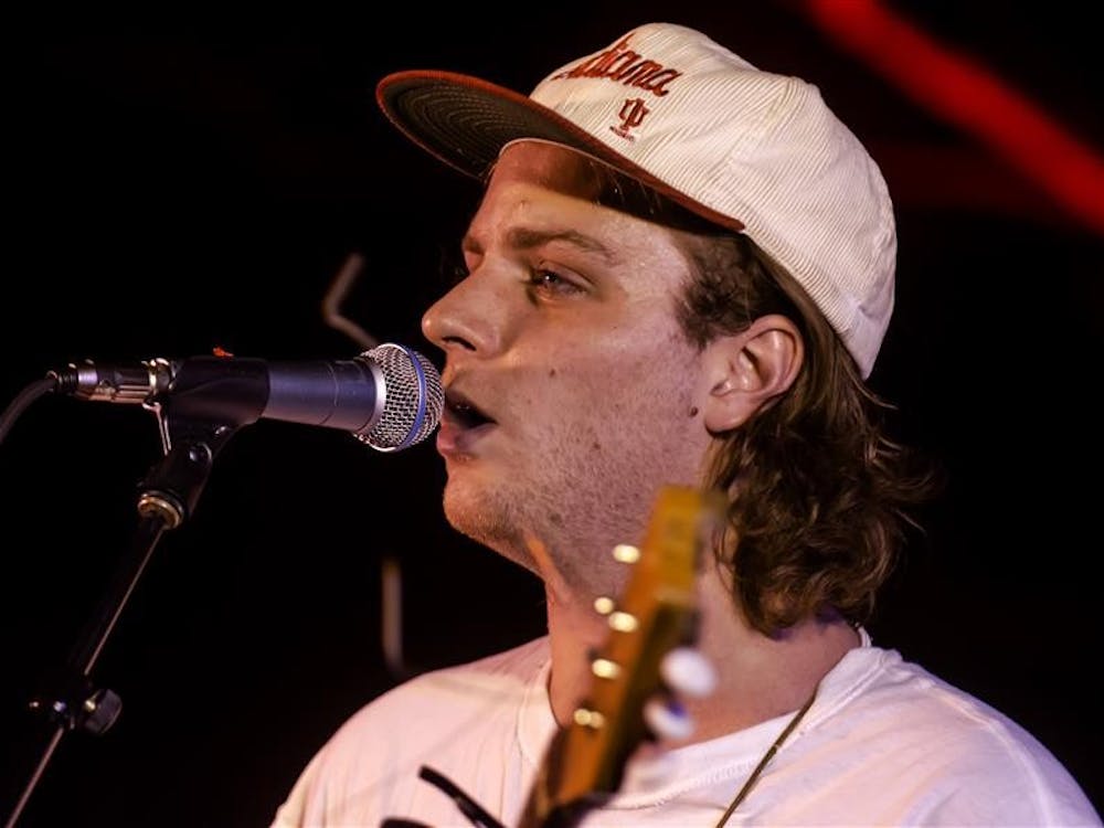 Headliner Mac DeMarco strums a track from his latest album during the Culture Shock music festival in Dunn Meadow on Saturday. Culture Shock 2014 was presented by WIUX student radio and BCEC.  