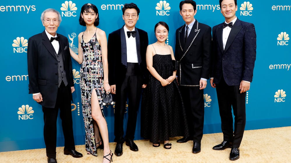 The cast of the Neftlix show &quot;Squid Game&quot; is pictured at the 74th Primetime Emmy Awards ceremony. The show garnered six Emmy wins among 14 nominations and was one of the most viewed streaming programs in 2021.