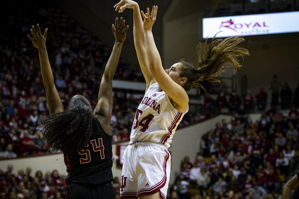 <p>Senior forward Mackenzie Holmes goes for a shot against Rutgers Jan. 29, 2023, at Simon Skjodt Assembly Hall in Bloomington. Holmes and freshman guard Yarden Garzon earned Big Ten weekly awards.</p>