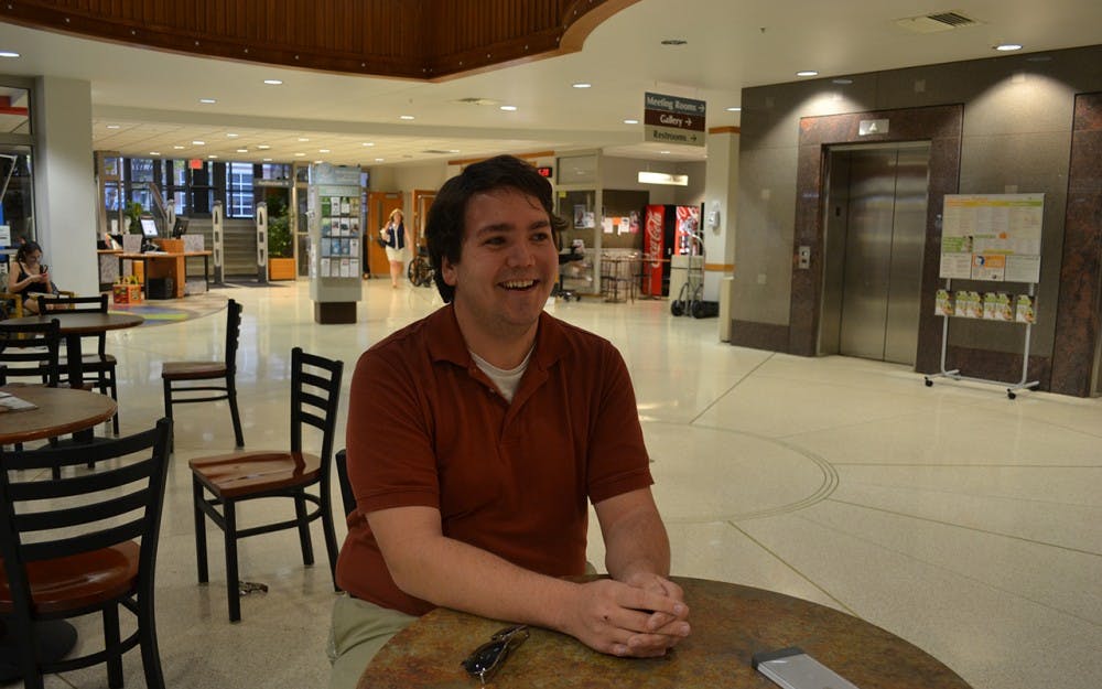 Dakota Hudelson, co-facilitator for the Bloomington Green Party, speaks in an interview about the goals of the local party at the Monroe County Public Library.