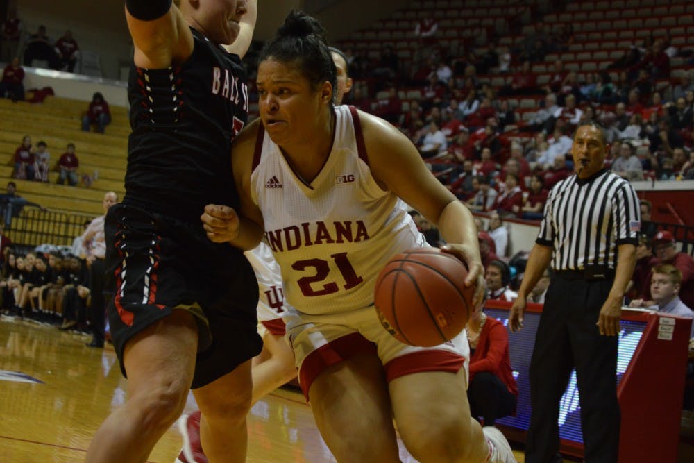 Senior guard Karlee McBride pushes on her opponent to make her way towards the basket Thursday evening during the first round of the WNIT. The Hoosiers beat Ball State 71-58 and will play&nbsp;a second round game against St. Louis on Sunday.