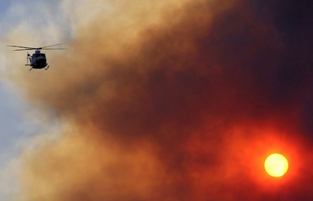 APTOPIX Wildfires Grounded Aircraft