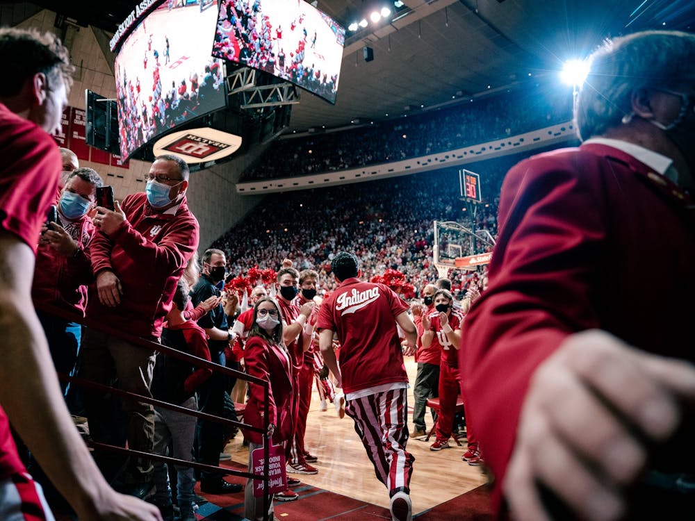 The Indiana men’s basketball team runs onto the court ahead of its game against No. 4 Purdue on Jan. 20, 2022. Indiana announced its incoming freshman class on June 9, which four scholarship players — five-star recruit Malik Reneau and four-star recruits Jalen Hood-Schifino, Kaleb Banks and CJ Gunn.