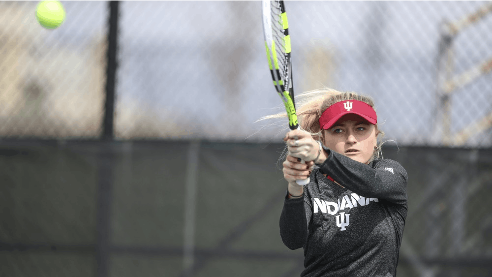 Then-junior Madison Appel hits the ball during the Hoosiers match against the Iowa Hawkeyes.