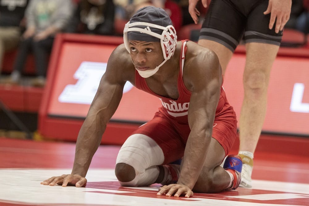 <p>Then-sophomore DJ Washington prepares for his match on Jan. 29, 2022, at Wilkinson Hall. Indiana wrestling concluded its season at the NCAA Championships.</p>