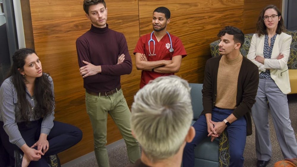 Dustin Nowaskie, IU medical student and founder of OutCare Health, talks with IU School of Medicine leaders and LGBTQ members to work to increase the amount of LGBTQ education and training on December 10, 2019. The IU School of Medicine will hold its fourth annual LGBTQ Virtual Health Conference this week. 