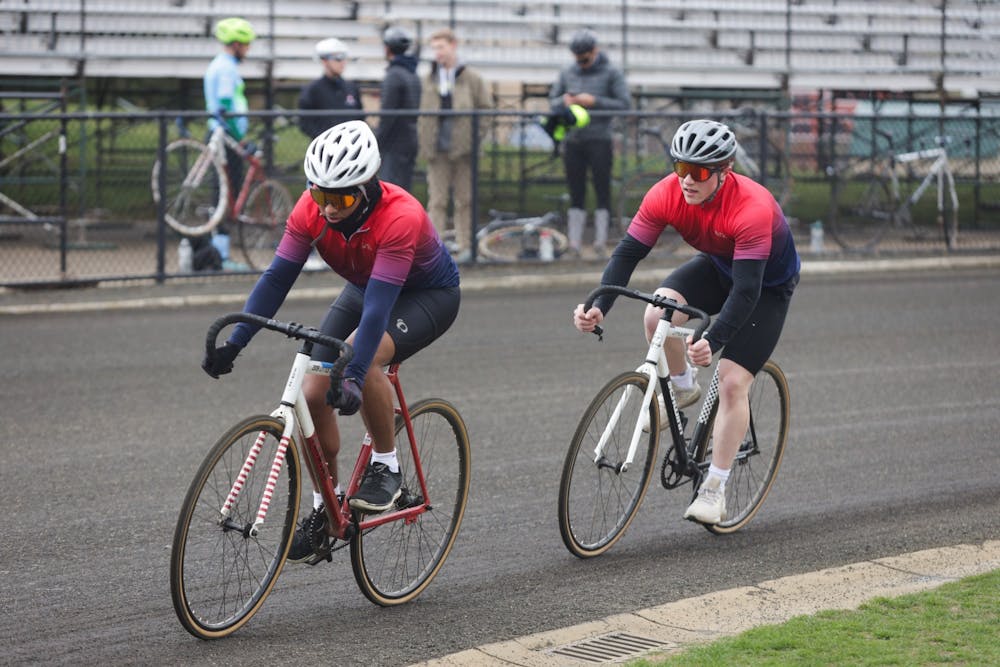 <p>Cyclists from Phi Gamma Nu compete in Team Pursuits on April 9, 2022, at Bill Armstrong Stadium. The team competed against Wild Aces Cycling. </p>
