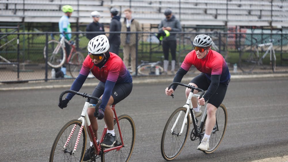 Cyclists from Phi Gamma Nu compete in Team Pursuits on April 9, 2022, at Bill Armstrong Stadium. The team competed against Wild Aces Cycling. 
