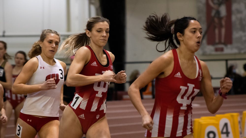 Bailey Hertenstein, middle, wins the mile race at Indiana University Relays Jan. 29, 2022, at Gladstein Fieldhouse. Hertenstein was the only Hoosier to represent Indiana women’s track and field at the NCAA Indoor Track and Field Championships.