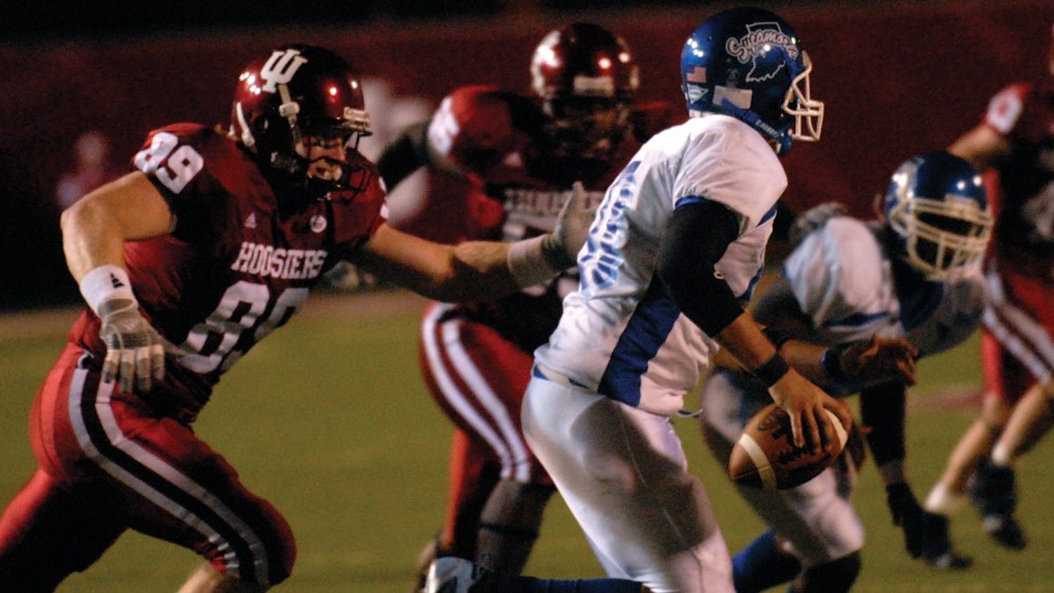 IU tight end Brian Zematis chases after Indiana State quarterback Reilly Murphy during the 4th quarter of IU's 55-7 victory in 2007 at Memorial Stadium. It was the first game for IU since the death of Coach Terry Hoeppner. 