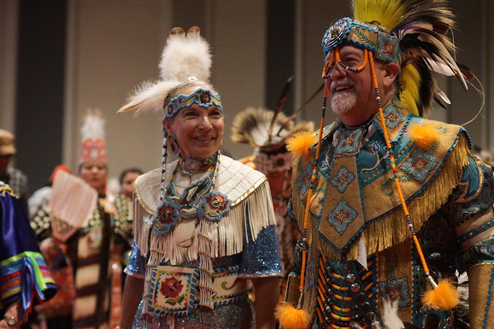 <p>A couple participates in a group dance during the IU Traditional Powwow on April 9, 2022, at the Marching Hundred Hall. The Office of the Vice President for Diversity, Equity, and Multicultural Affairs will host a presentation at the Sample Gates to celebrate the Indigenous People&#x27;s Day proclamation on Oct. 10.</p>