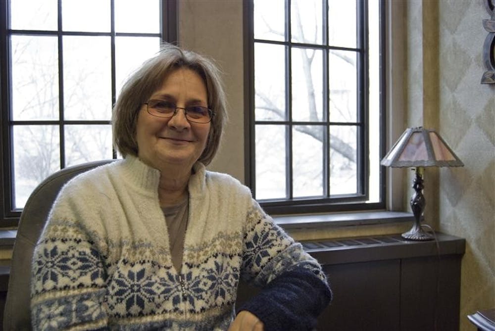 IU faculty advisor and local radio host Helen Harrell sits in her office Tuesday afternoon in Woodburn Hall. Harrell, along with the IU project "Voices and Visions: Islam and Muslims From A Global Perspective," will receive an award from the Bloomington Human Rights Commission.