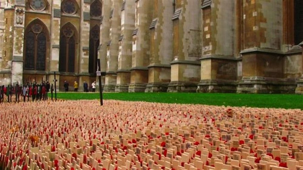 Crosses with poppies in front of Westminster Abbey in London remember fallen British soldiers for Remembrance Day on Nov. 11.