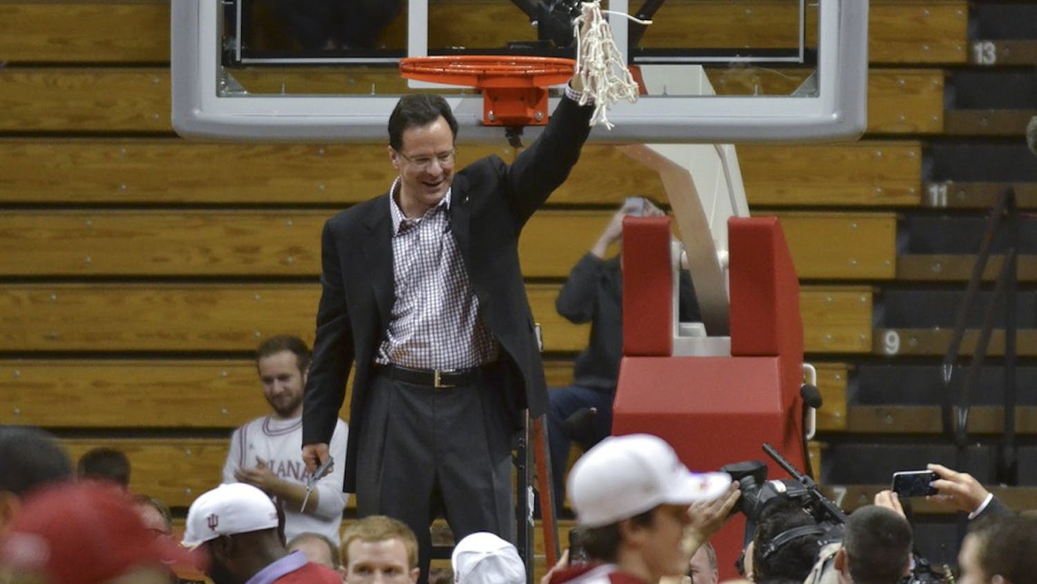 Head Coach Tom Crean holds the net after finishing the regular season on Sunday, March 6, 2016 at the Assembly Hall. 
