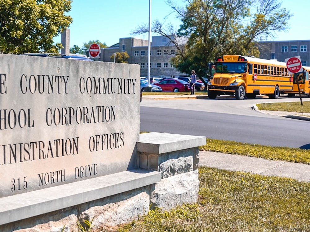 A sign for the Monroe County Community School Corporation Administration Office is seen Sept. 2, 2021, during the afternoon dismissal at Bloomington South High School. Some parents of students in MCCSC schools are requesting the Monroe County school board reevaluate its vote to disarm all resource officers, according to WTHR.