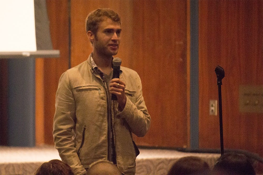 Shane Bitney Crone answers audience members' questions after a screening of Bridegroom on Tuesday night in Whittenberger Auditorium. 