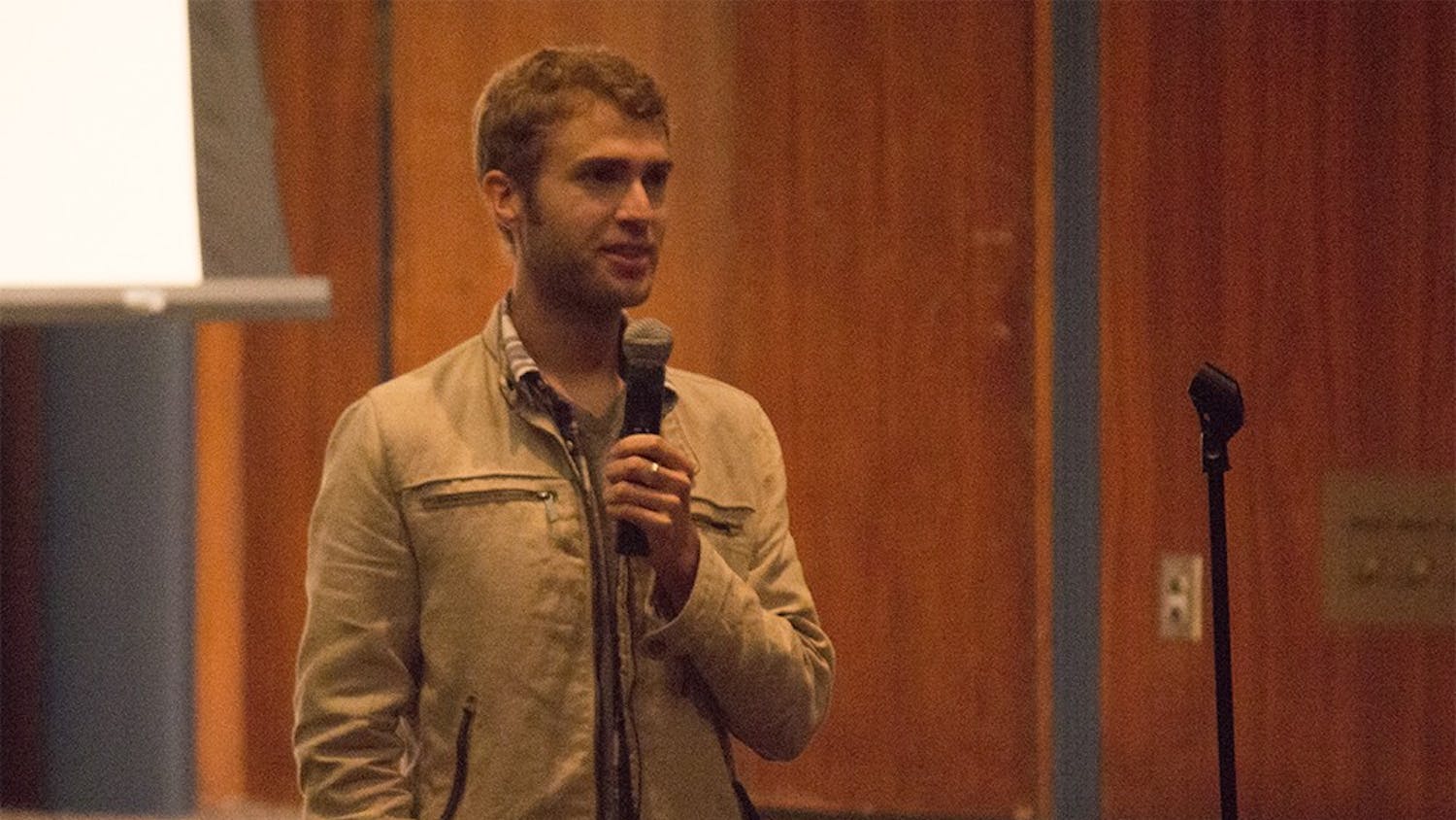 Shane Bitney Crone answers audience members' questions after a screening of Bridegroom on Tuesday night in Whittenberger Auditorium. 