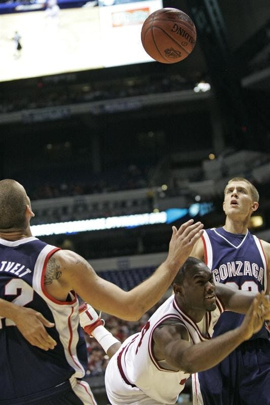 Freshman guard/forward Malik Story loses his balance as the ball comes loose during IU's 70-54 loss to Gonzaga on Saturday at Lucas Oil Stadium.