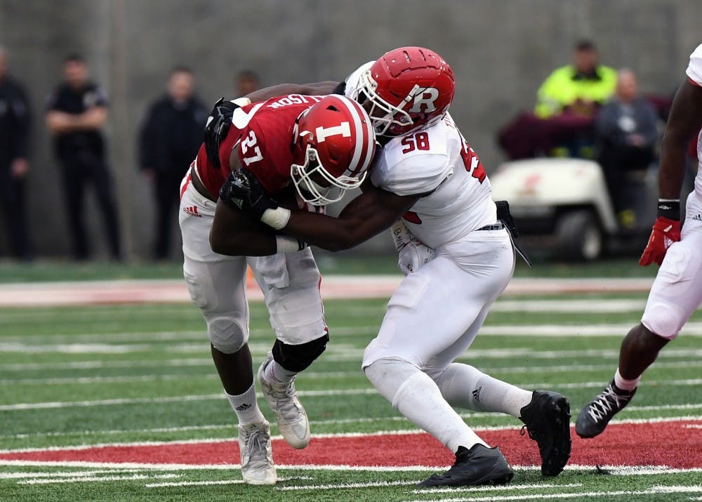 Then-freshman, now sophomore running back Morgan Ellison runs the ball in the first half against Rutgers on Nov. 18, 2017, at Memorial Stadium. IU Athletics announced Friday night Ellison has been suspended from IU for 2.5 years and is permanently dismissed from the IU football team.