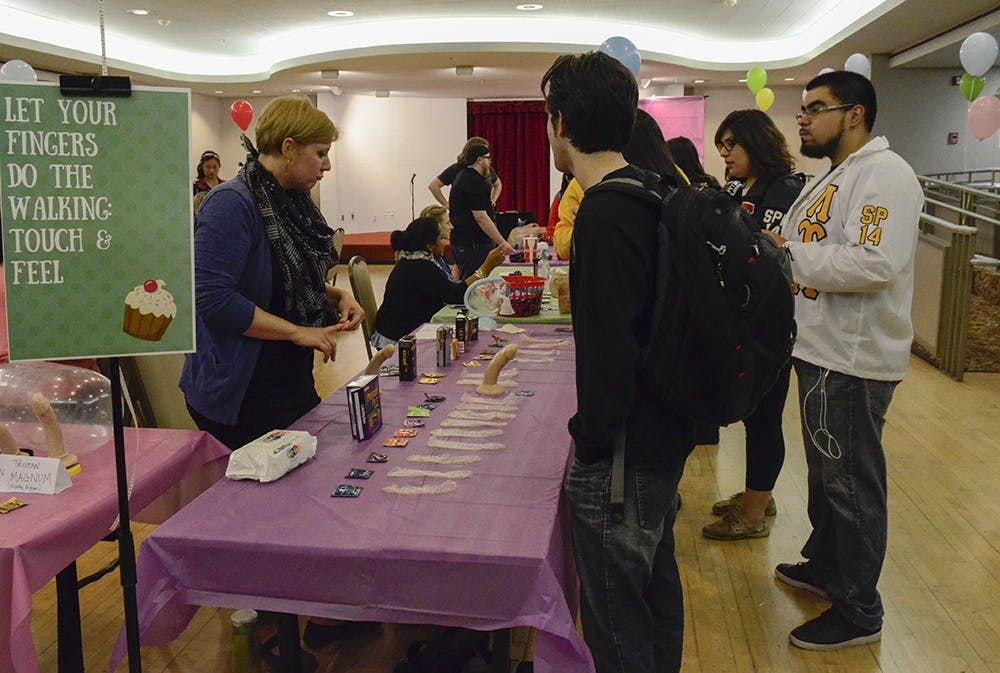 Different sizes, types and textures of condoms from around the world were on display at Cupcakes and Condoms in the Frangipani Room of the Indiana Memorial Union on Monday. The event also had free cupcakes and condoms for students to take. 