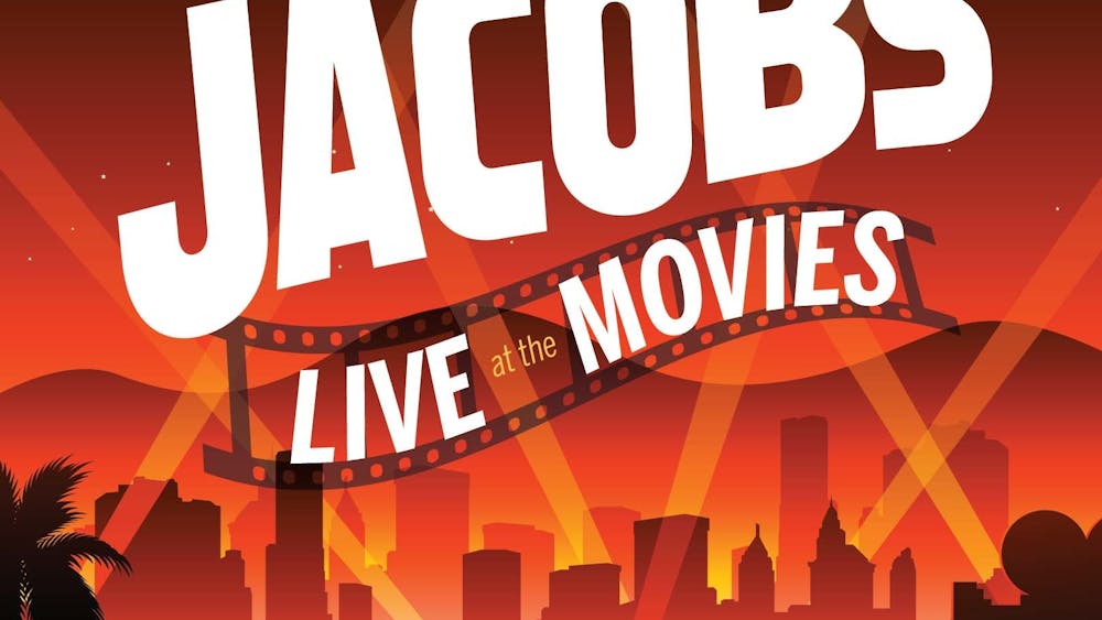 A graphic for &quot;Jacobs Live at the Movies&quot; is pictured. “Jurassic Park” will be shown at the Musical Arts Center at 7:30 p.m. Feb. 18 and 19, featuring the Jacobs School of Music Concert Orchestra. 
