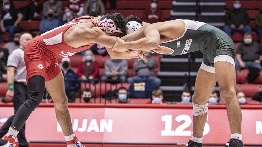 Indiana Sophomore Jacob Moran wrestles against Michigan State Freshman Tristan Lujan on Jan. 17, 2022, at Wilkinson Hall. Indiana lost to University of Chattanooga 15-21 on Feb. 20, 2022, at Wilkinson Hall. 
