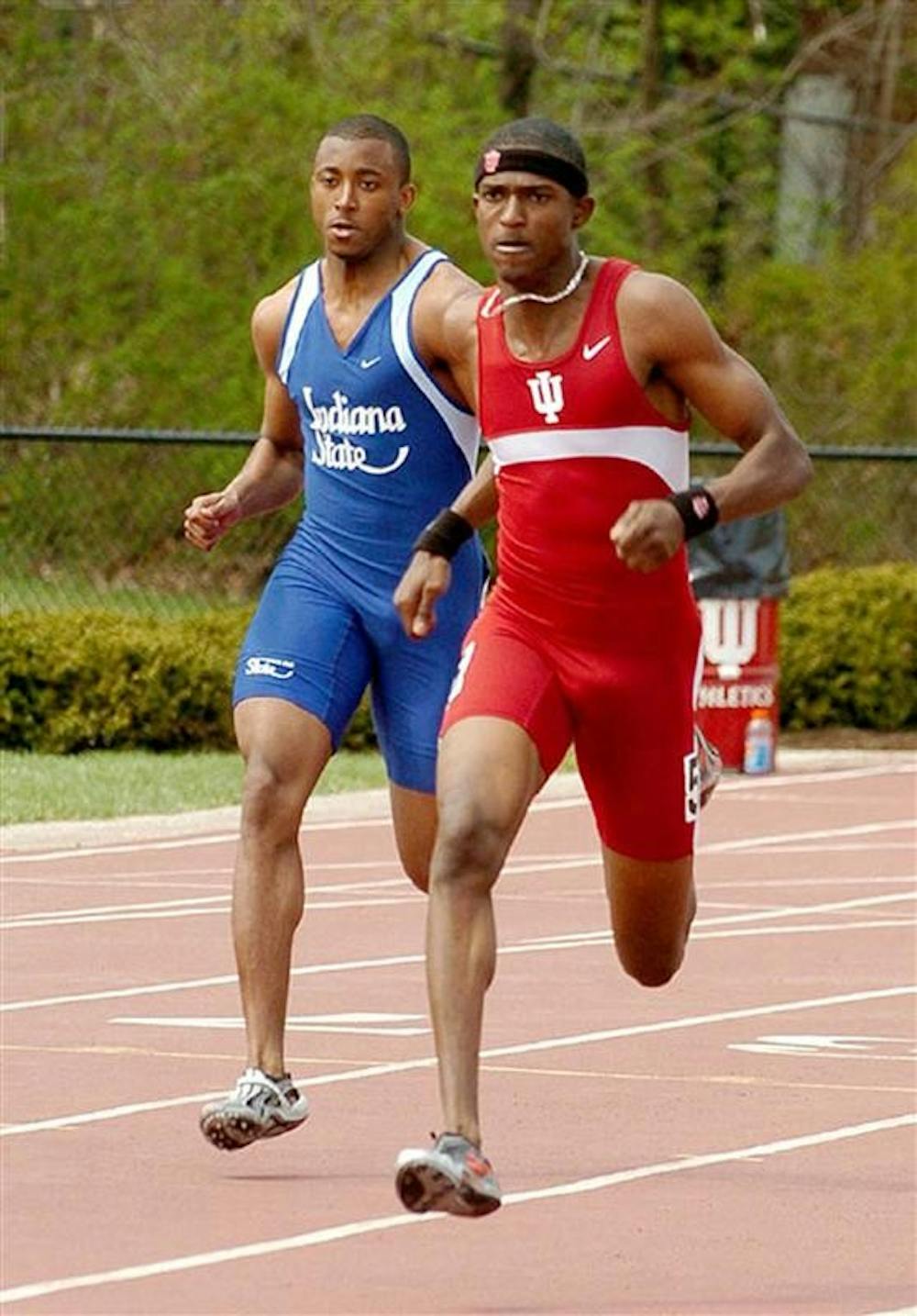 IU alum and All-American David Neville, shown here in a 2004 event, races past the competition during the Indiana Relays on Saturday, April 10, 2004.