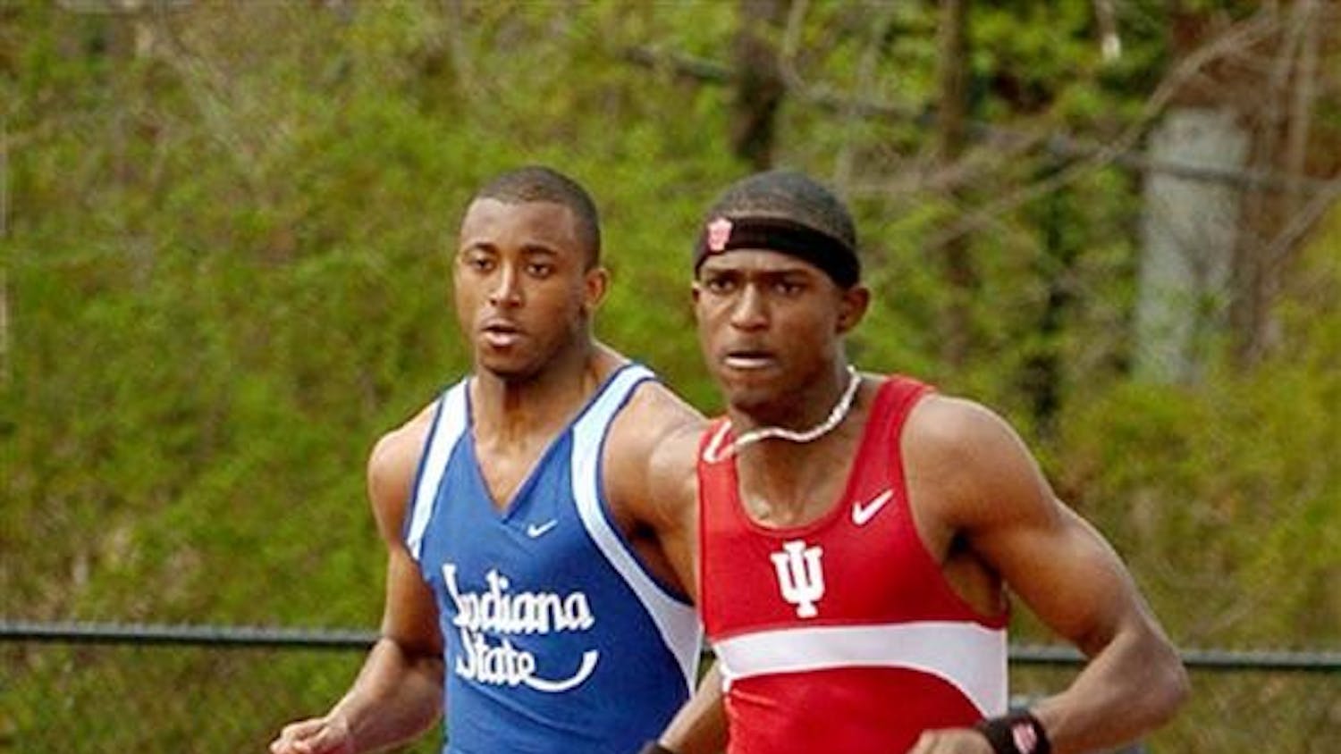 IU alum and All-American David Neville, shown here in a 2004 event, races past the competition during the Indiana Relays on Saturday, April 10, 2004.