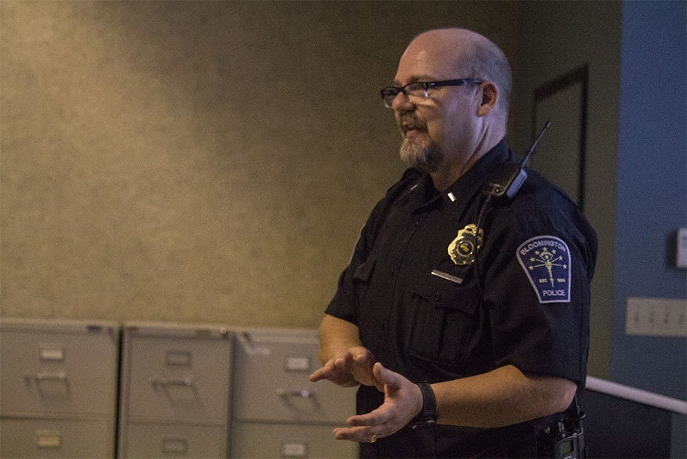 Lt. Steve Kellams explains the Police Explorer program to intersted community members in a meeting at Bloomington Police Department on Wednesday night. The program is aimed at people ages 14 to 20 that want to pursue a career in the police force.
