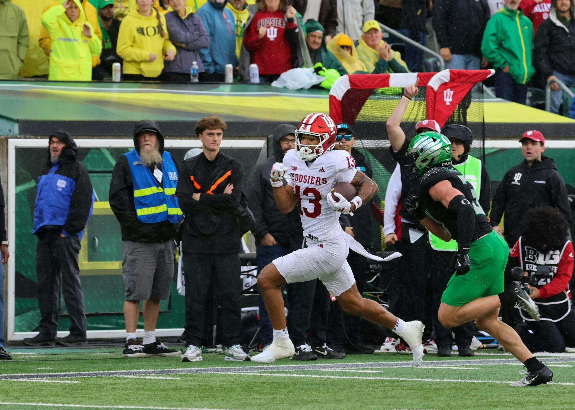 Indiana senior wide receiver Elijah Sarratt runs the ball against Oregon at Autzen Stadium Oct. 11. Sarratt scored a touchdown for the Indiana Hoosiers. 