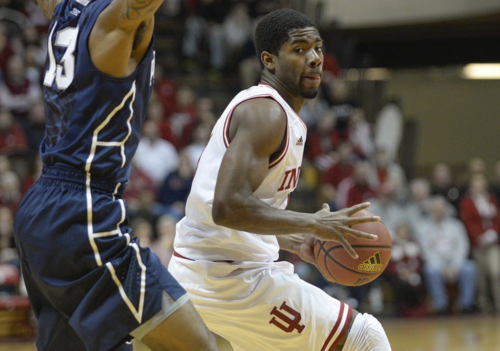 Freshman Rob Johnson spins around his defender during IU's game against Penn State on Tuesday.