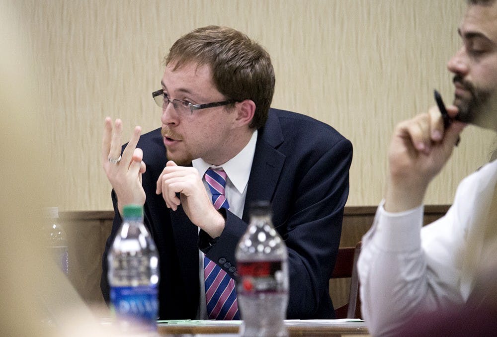 Ari Hoffman, democratic spokes person for the College Democrats at Indiana University, speaks about the issues of guns getting into the wrong hands Monday at the Wright Formal Lounge. 