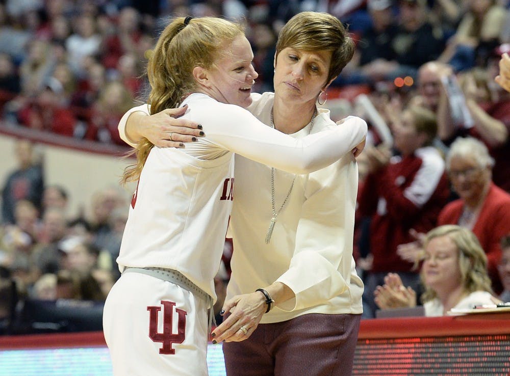 <p>Senior guard Grace Withrow hugs head coach Teri Moren during the Senior Day game March 3 game against Purdue in Simon Skjodt Assembly Hall. Withrow scored IU's final point of the game on a free throw.</p>