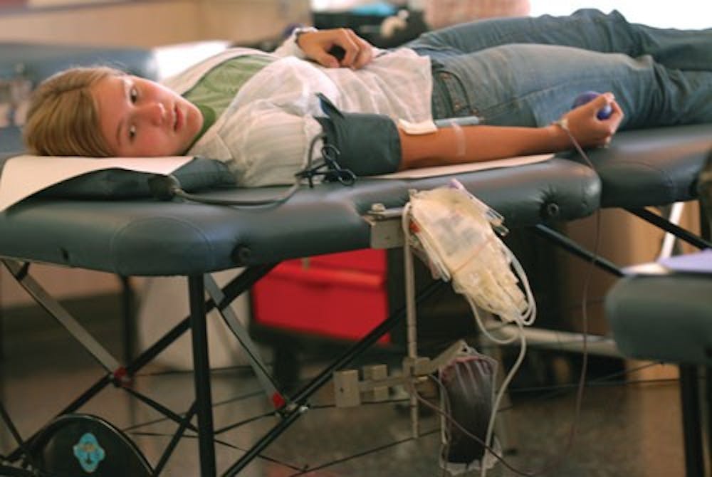 IDS File Photo
Freshman Joan Russick donates blood at Teter quad Sept. 14, 2006. 