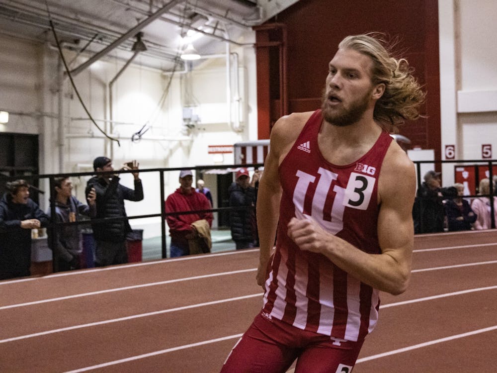 Junior distance runner Cooper Williams runs the second lap of the 600-meter race during the Gladstein Invitational on Jan. 25 in Gladstein Fieldhouse. Williams took second in the 600-meter during the Meyo Invitational on Feb. 7-8 in South Bend, Indiana.
