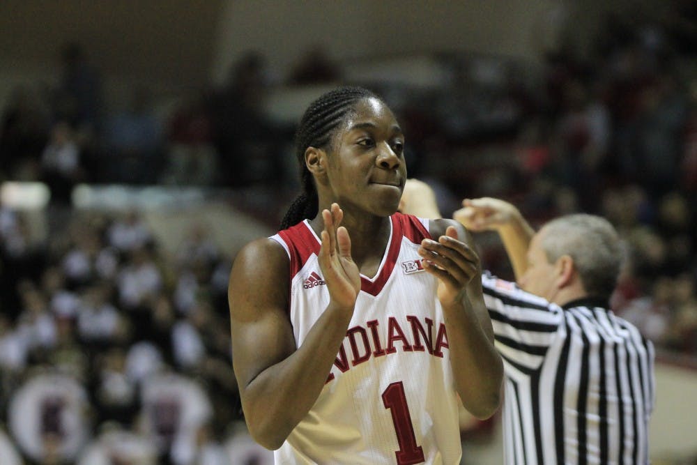 <p>Sophomore guard Bendu Yeaney claps after a timeout is called by Purdue in IU's game against the Boilermakers on March 22 at Simon Skjodt Assembly Hall.</p>