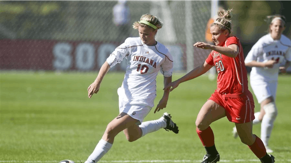 Freshman forward Rebecca Candler dribbles downfield during IU's 1-0 win against Ohio State on Sunday at Bill Armstrong Stadium.