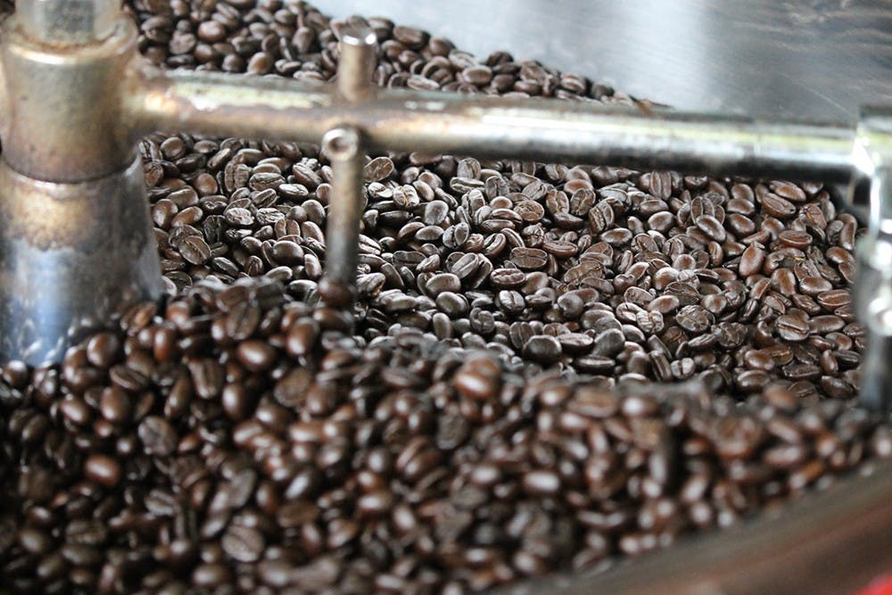 Laura's Ethiopian Harrar is a dark roast, so the beans are shinier, because darker roasts are oilier.
