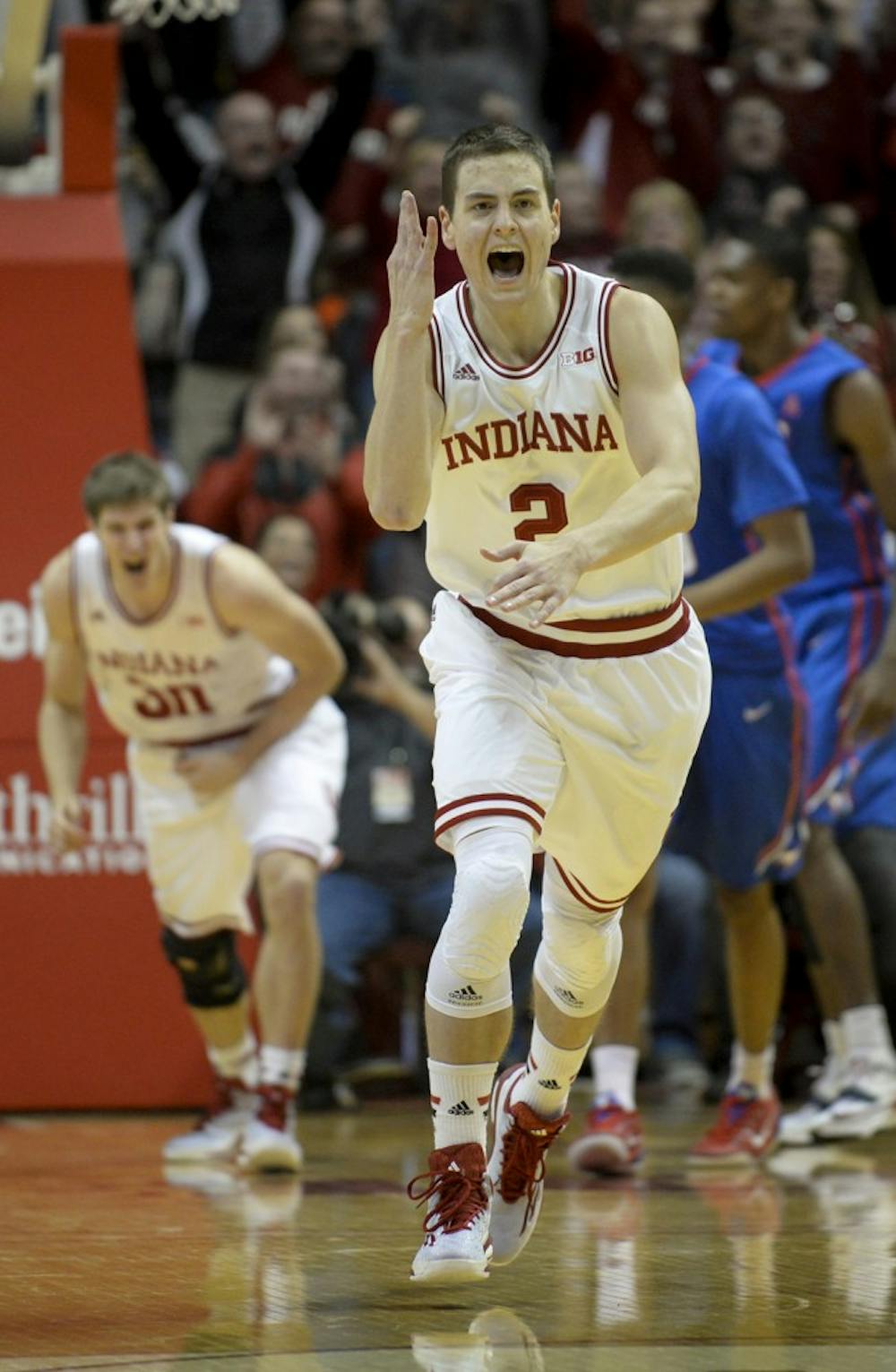 Junior Nick Zeisloft celebrates after making a three pointer late in IU's 74-68 victory against Southern Methodist on Thursday at Assembly Hall. Ziesloft's shot put the Hoosiers up 60-52 on the Mustangs late in the 2nd half. 