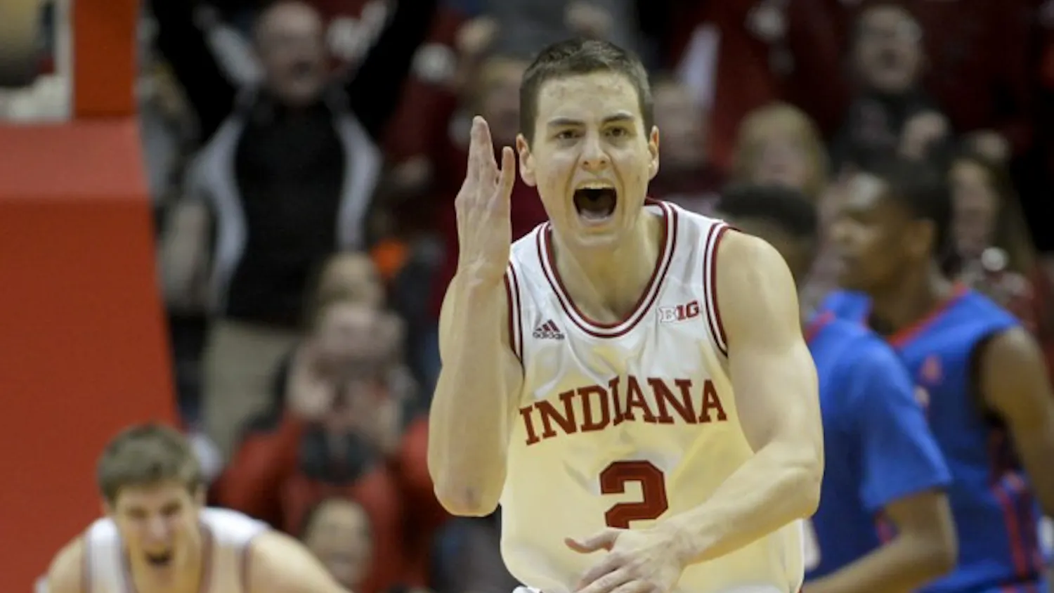 Junior Nick Zeisloft celebrates after making a three pointer late in IU's 74-68 victory against Southern Methodist on Thursday at Assembly Hall. Ziesloft's shot put the Hoosiers up 60-52 on the Mustangs late in the 2nd half.