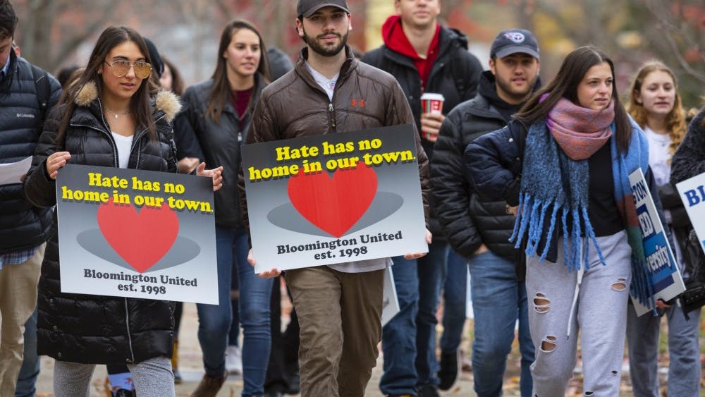 Protesters march Nov. 11, 2018, toward the steps of IU Auditorium during a march against hate.&nbsp;