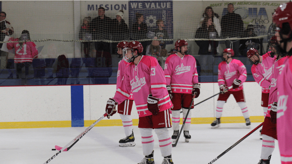 Then-freshman Nicholas Castracane warms up on senior night Jan. 27, 2023, at Frank Southern Ice Arena in Bloomington, Indiana. Indiana club hockey wore pink on senior night to support breast cancer awareness.
